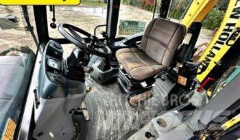 New Holland B 110 B لوادر ذات جرافات عكسية