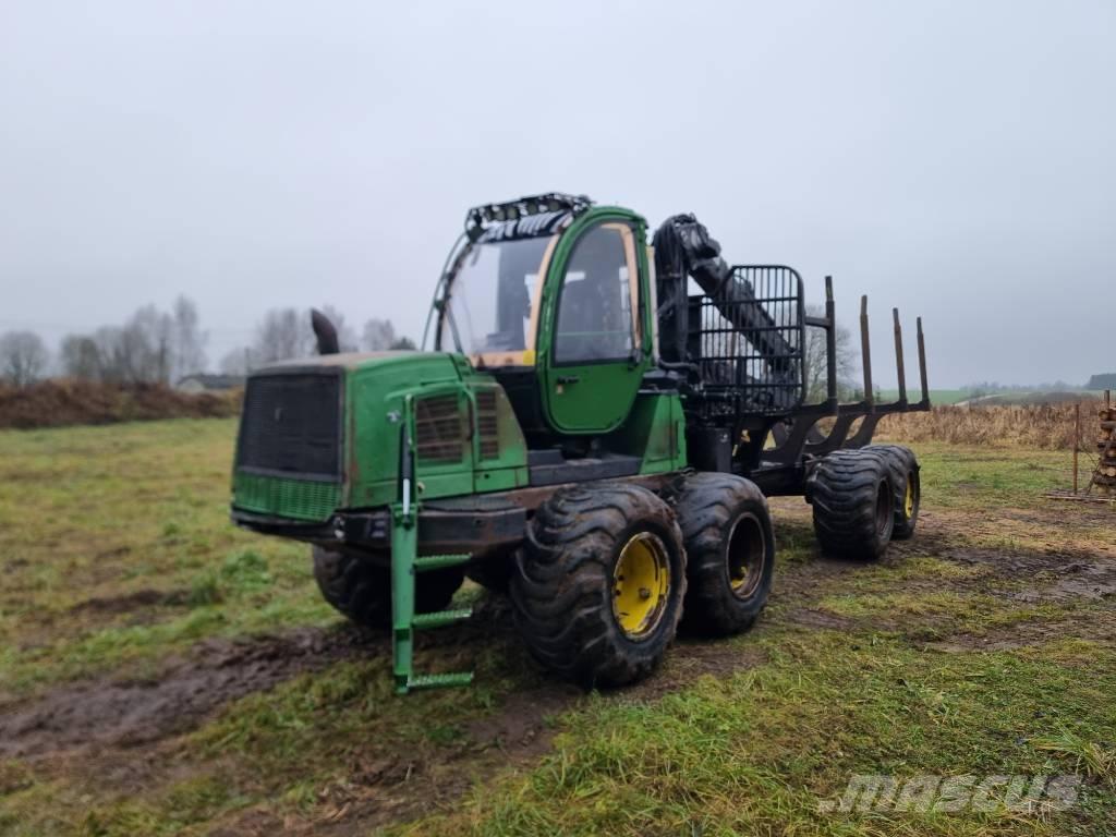 John Deere 1110 E شاحنات
