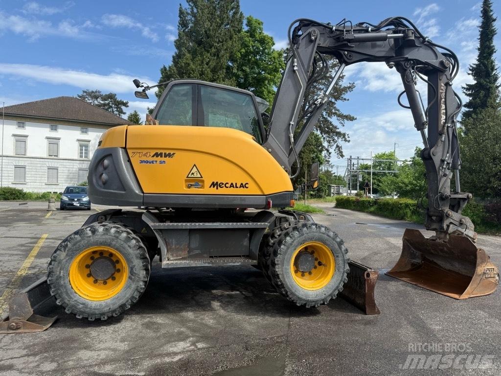 Mecalac 714 MW حفارات بعجل