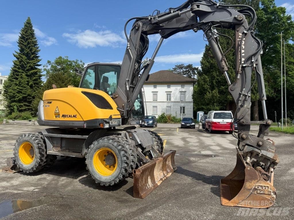 Mecalac 714 MW حفارات بعجل