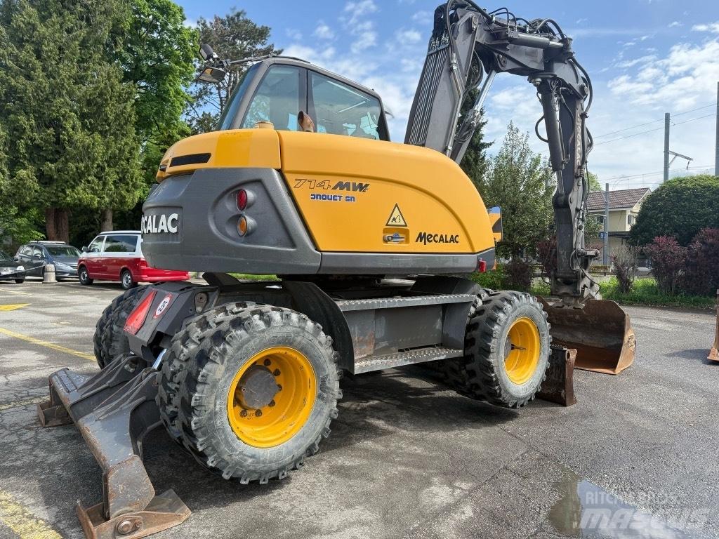 Mecalac 714 MW حفارات بعجل