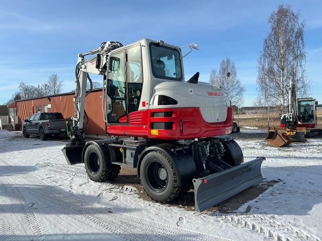 Takeuchi TB395W حفارات بعجل