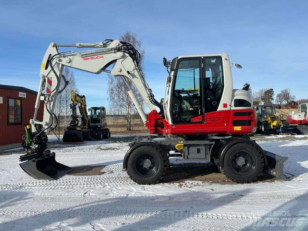 Takeuchi TB395W حفارات بعجل