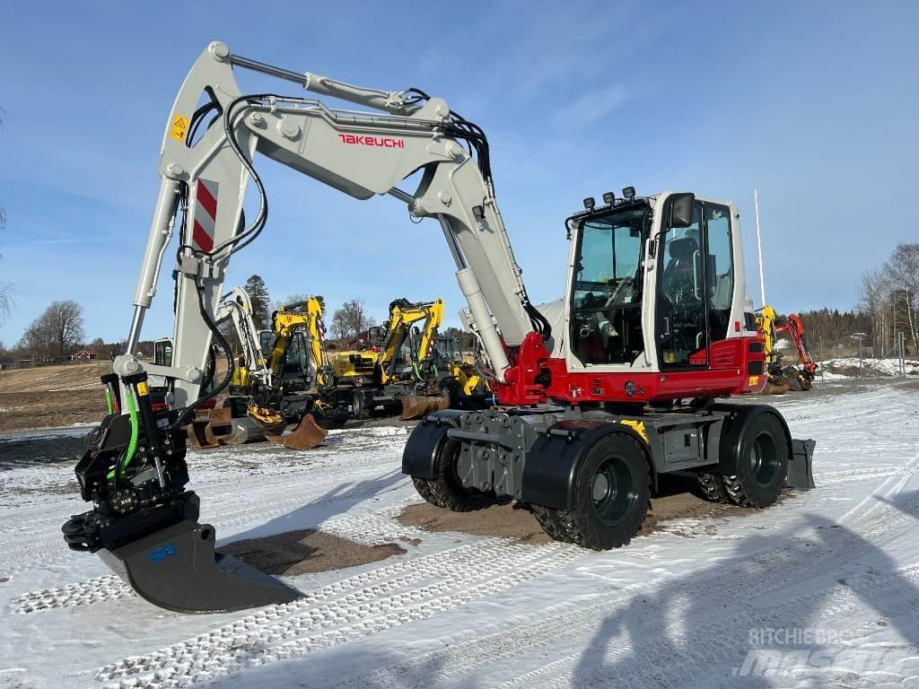 Takeuchi TB395W حفارات بعجل