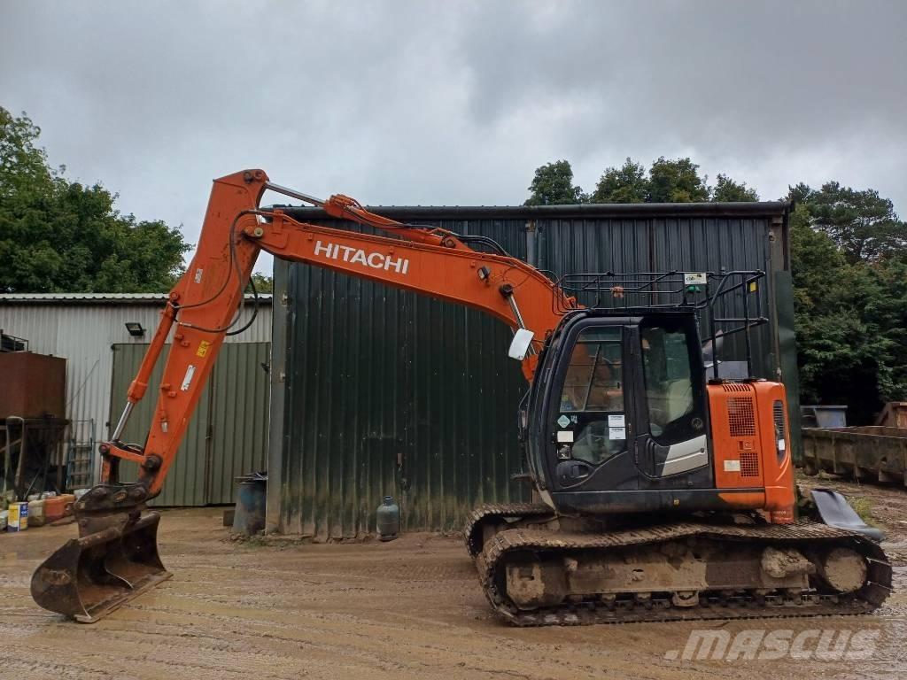 Hitachi ZX 135 US-6 حفارات زحافة