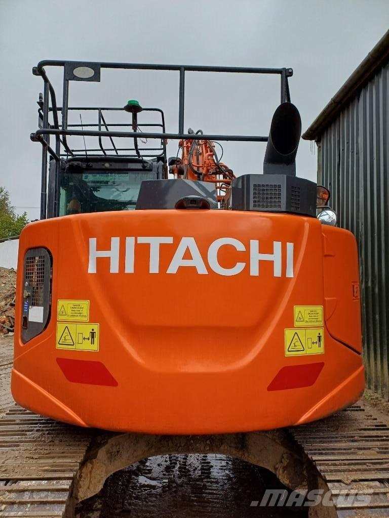 Hitachi ZX 135 US-6 حفارات زحافة