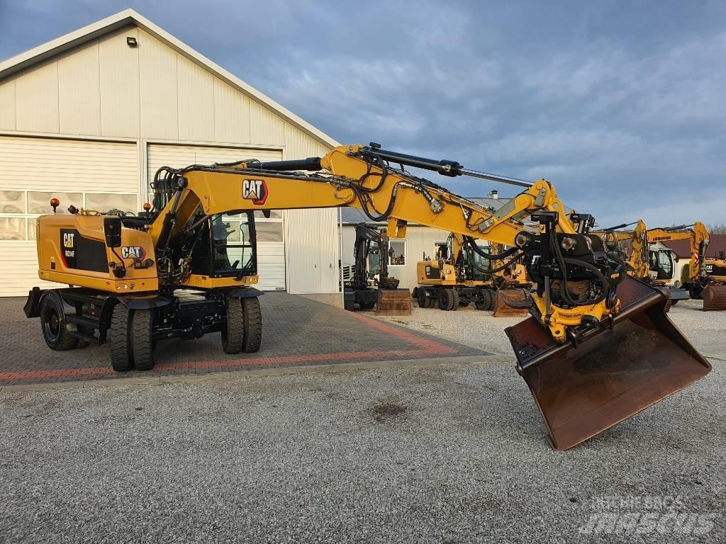CAT M 314 F حفارات بعجل