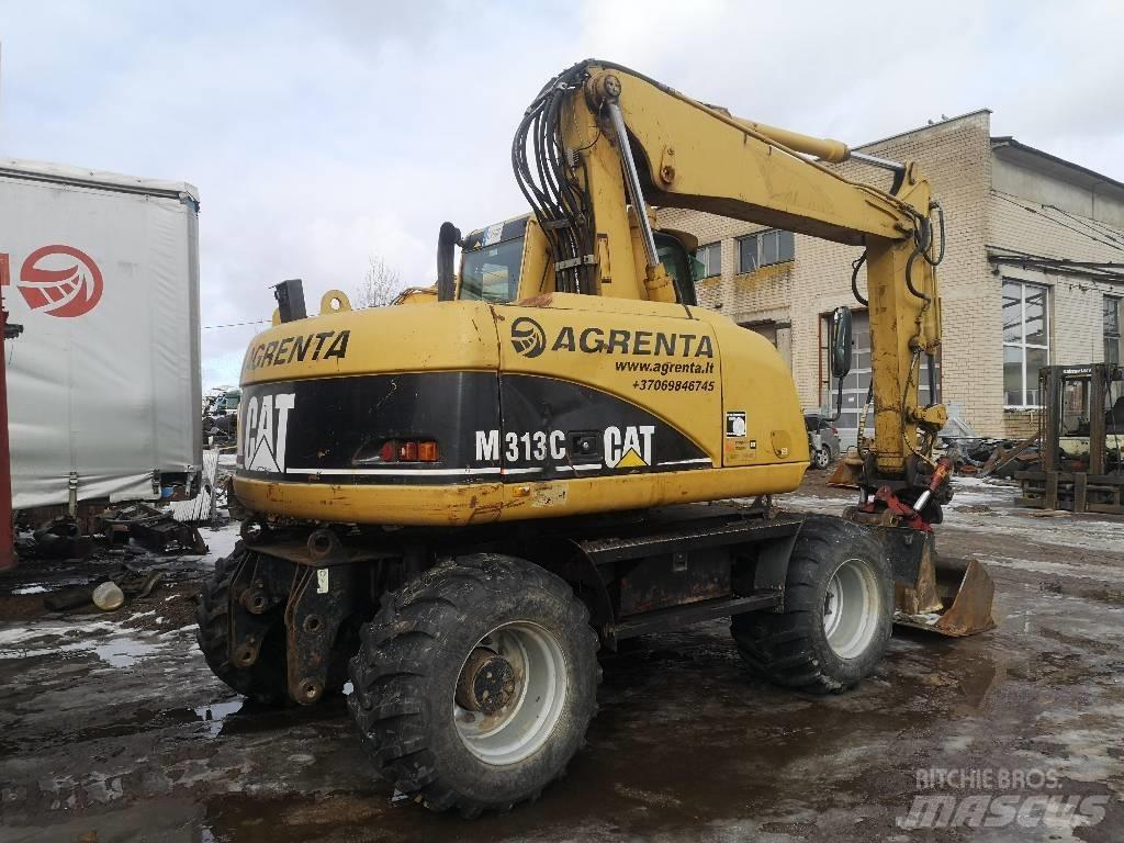 CAT 313 C حفارات بعجل