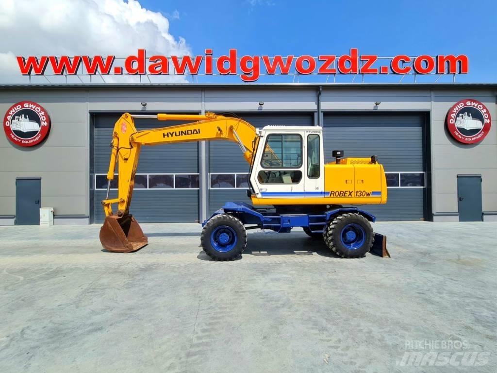 Hyundai Robex 130 W حفارات بعجل