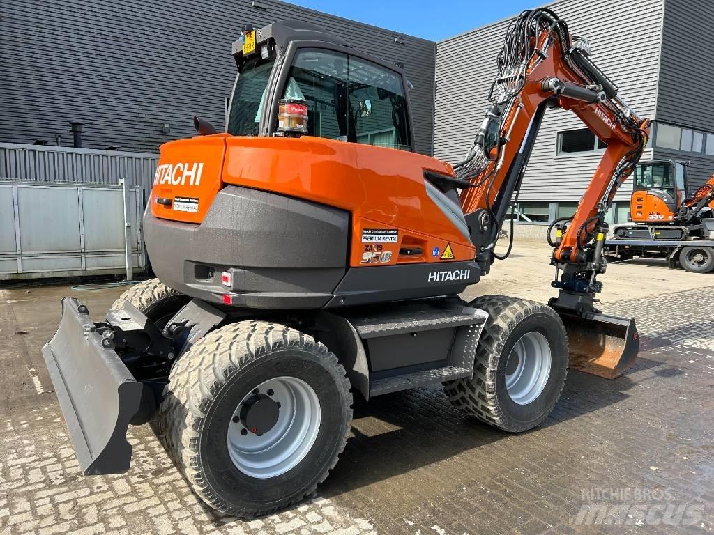 Hitachi ZX95W حفارات بعجل