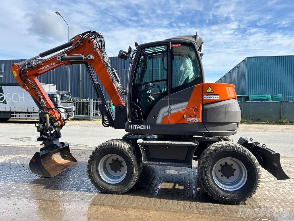 Hitachi ZX95W حفارات بعجل