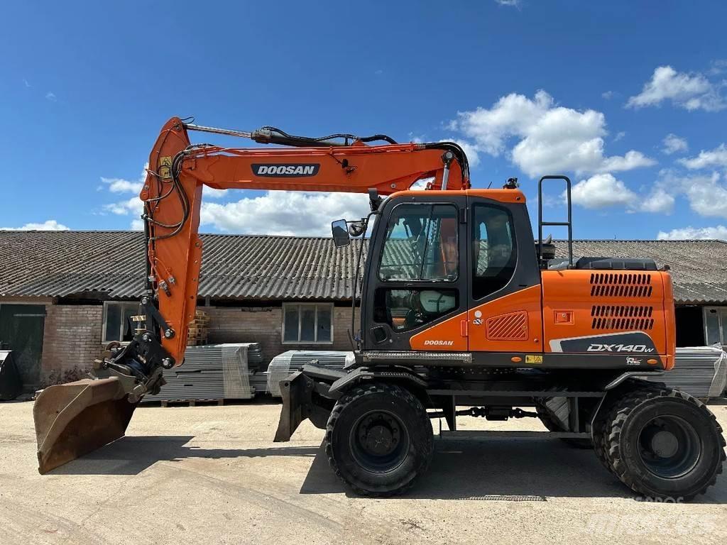Doosan DX140W-5 حفارات بعجل