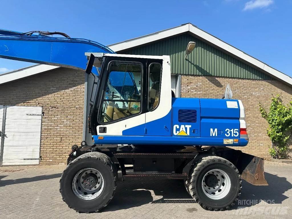 CAT M315 حفارات بعجل