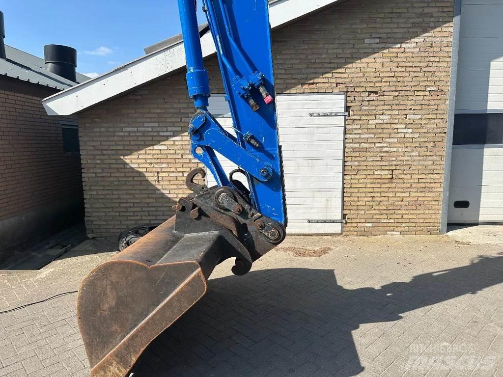 CAT M315 حفارات بعجل
