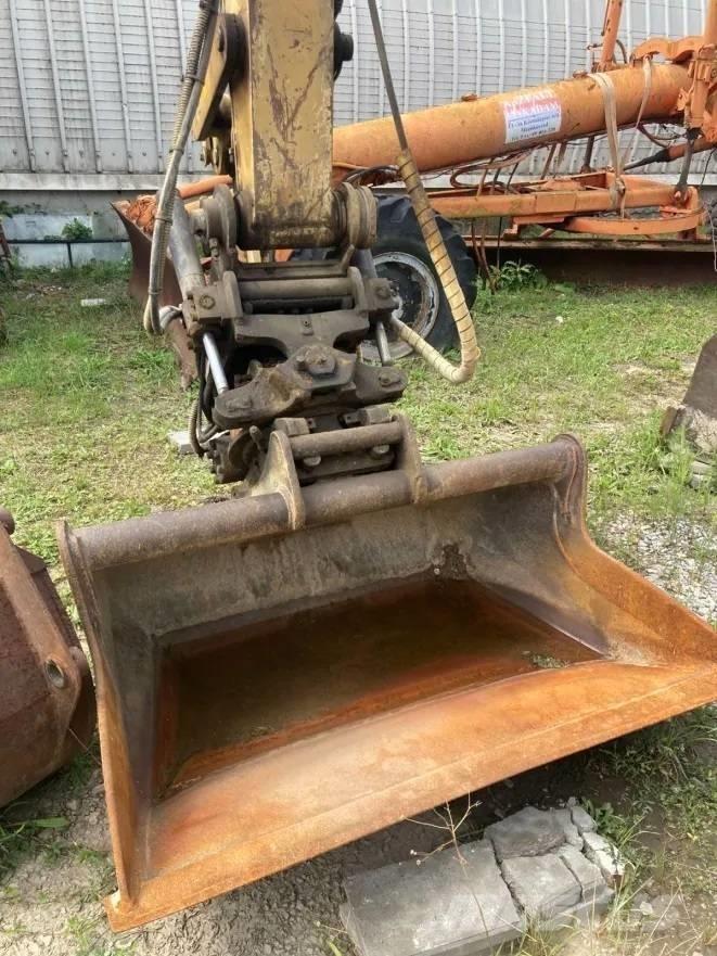 CAT M 312 حفارات بعجل