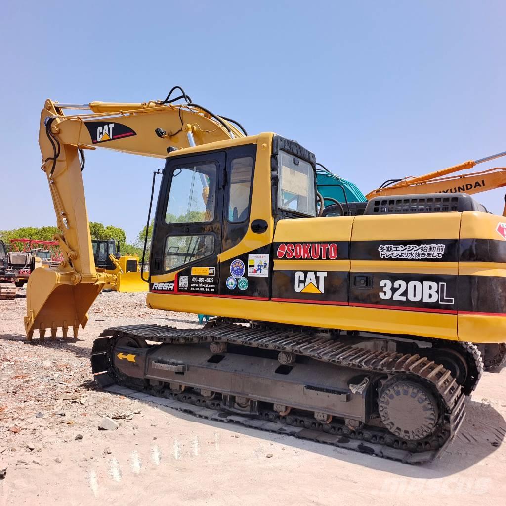 CAT 320 B L حفارات زحافة
