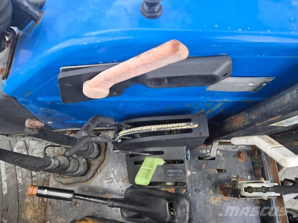 New Holland TL 90 A الجرارات
