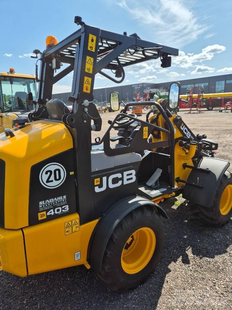 JCB 403 لوادر صغيرة