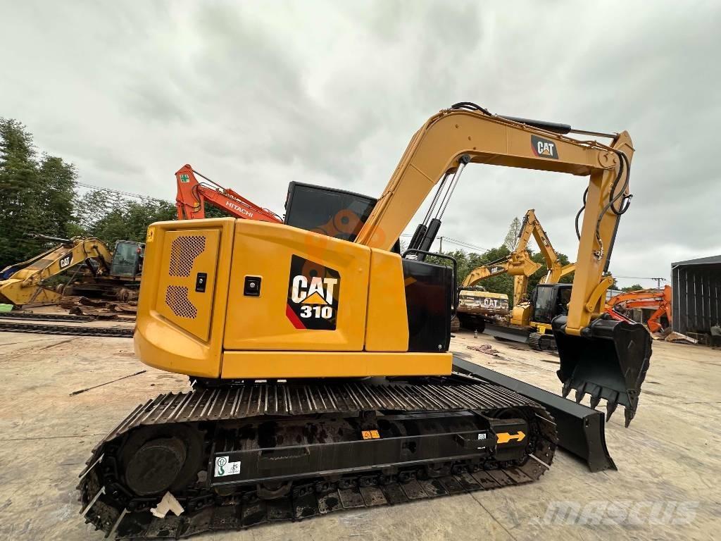 CAT 310 حفارات زحافة