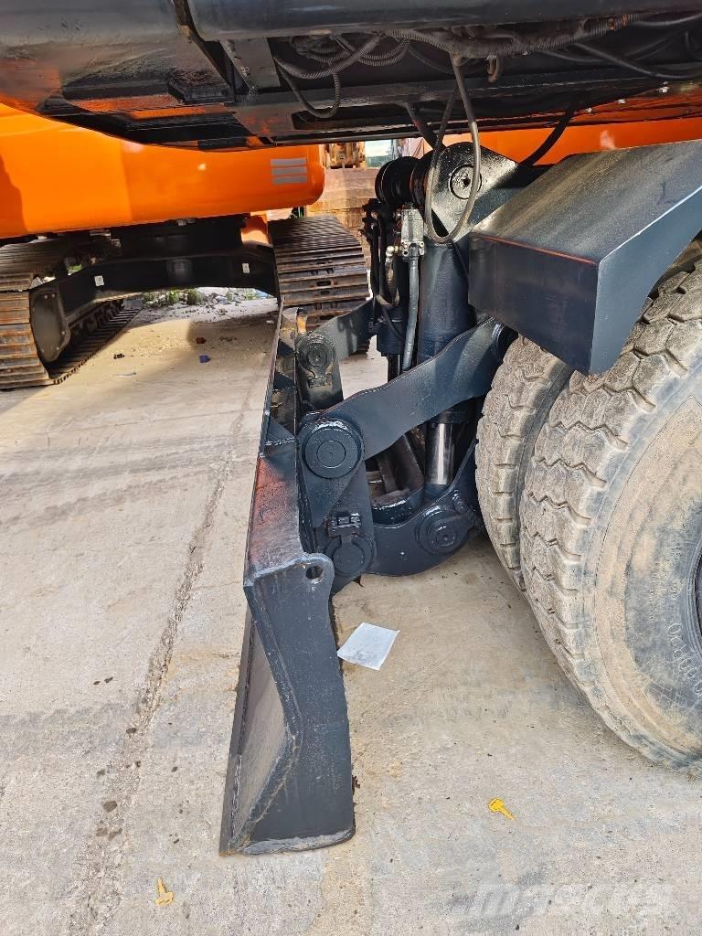 Hyundai R210W-9 حفارات بعجل