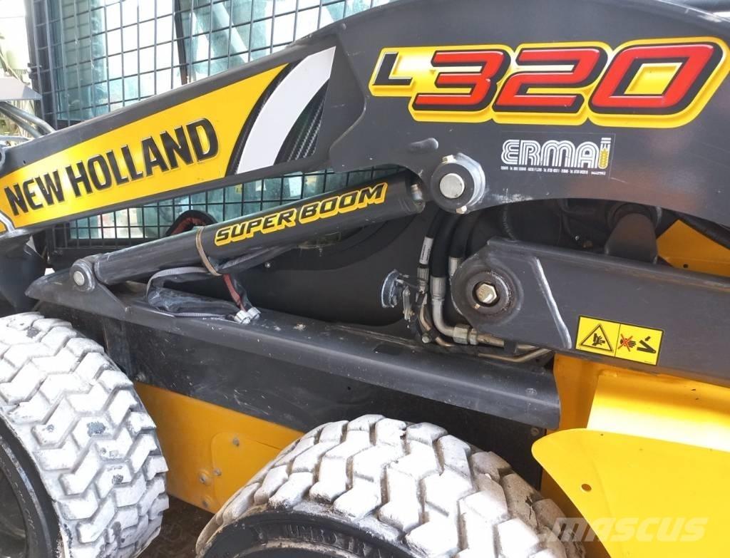 New Holland L320 لوادر انزلاقية التوجيه
