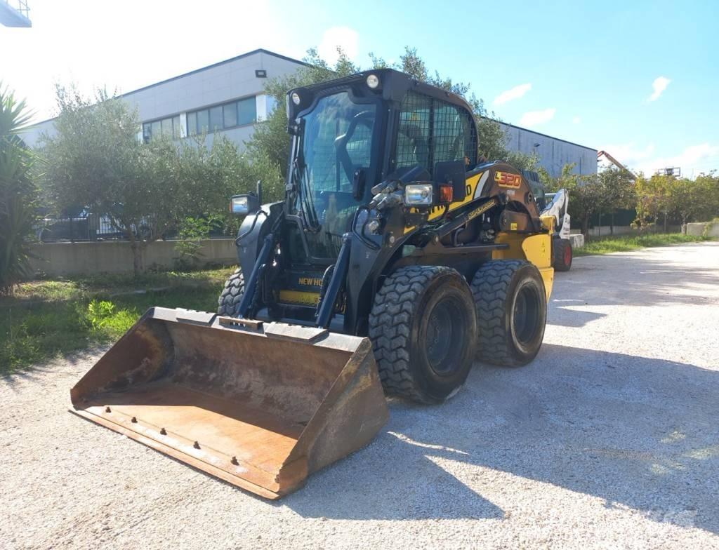 New Holland L320 لوادر انزلاقية التوجيه