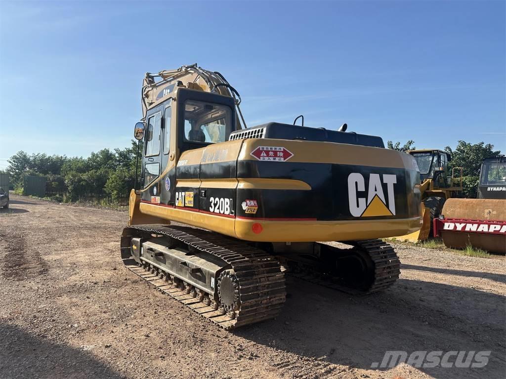 CAT 320 B L حفارات زحافة