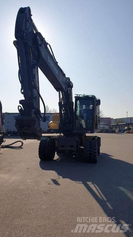 Volvo EW 210 C حفارات بعجل