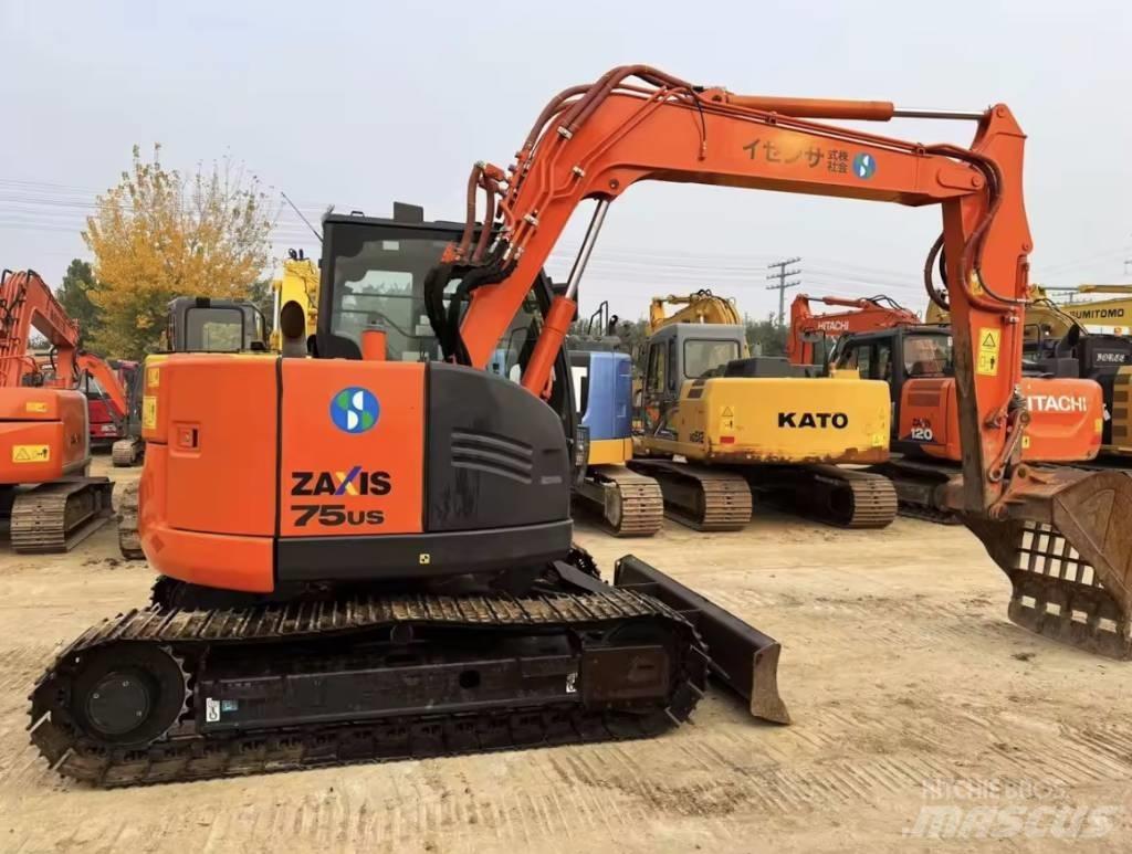 Hitachi ZX 75 US حفارات وسط 7 طن - 12 طن