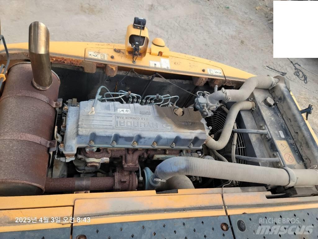 Hyundai Robex 140 W حفارات بعجل