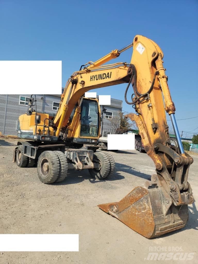 Hyundai Robex 140 W حفارات بعجل