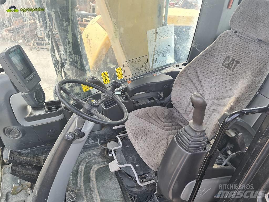 CAT M 315 D حفارات بعجل