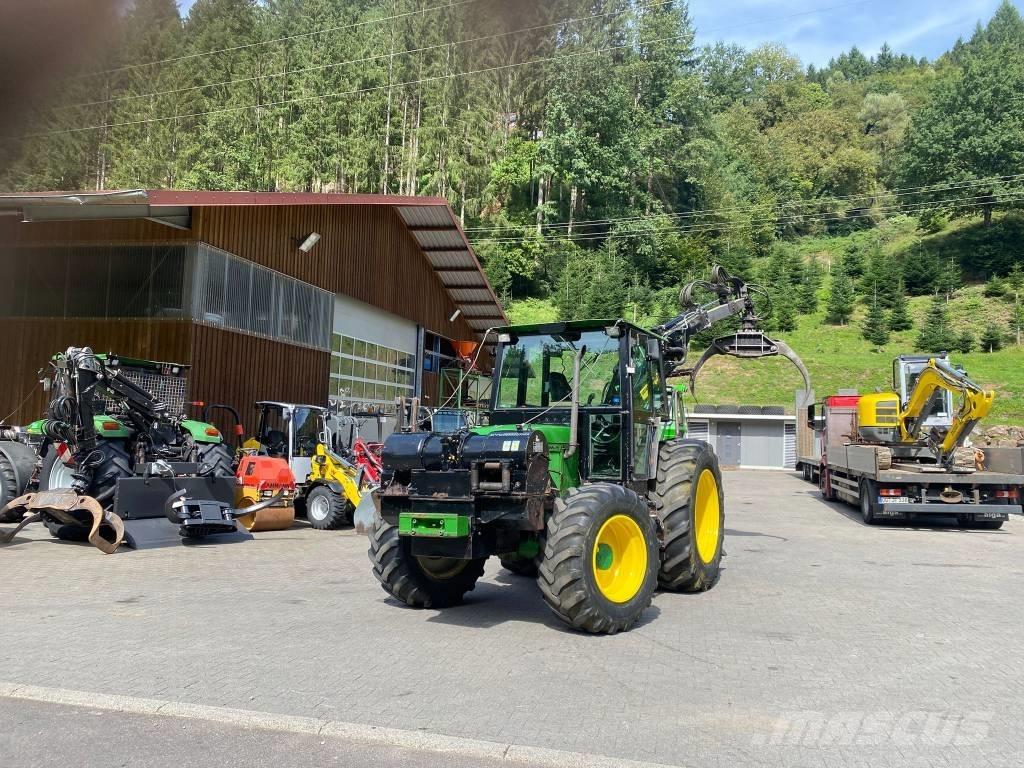 John Deere 6400 جرارات التحريج