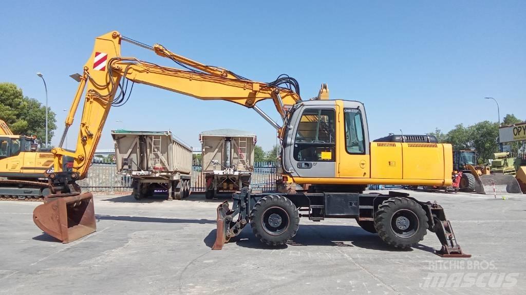 Hitachi ZX 180 W حفارات بعجل