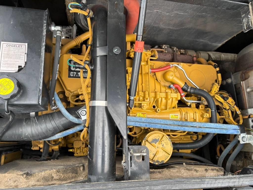 CAT M 318 F حفارات بعجل