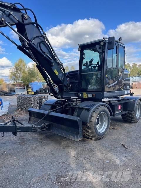 Schaeff TW110 حفارات بعجل