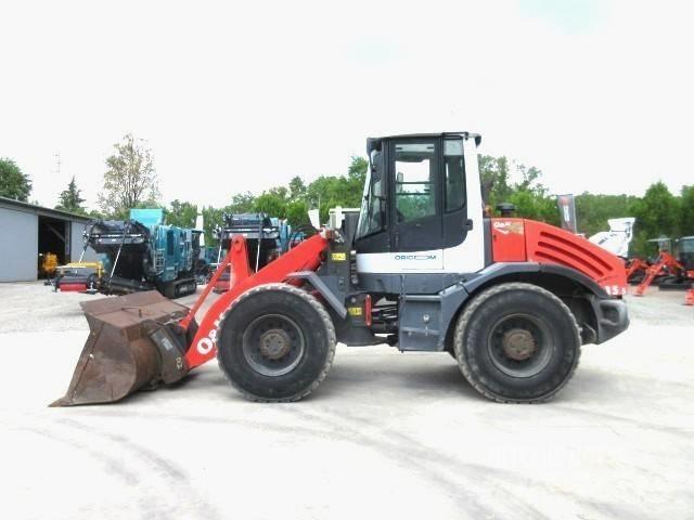 O&K L 15.5 لوادر بعجل
