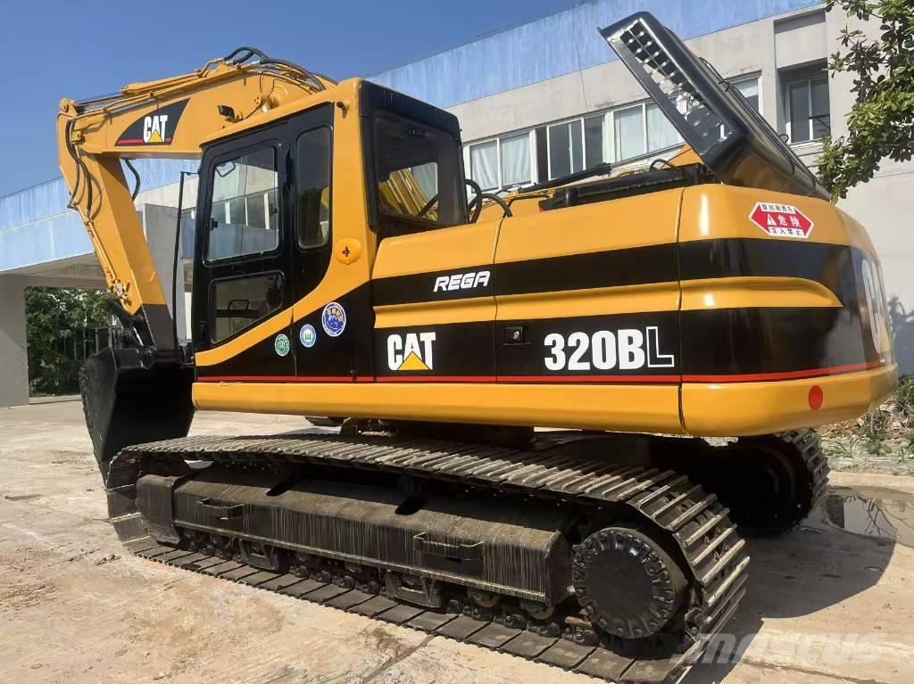 CAT 320 B L حفارات زحافة