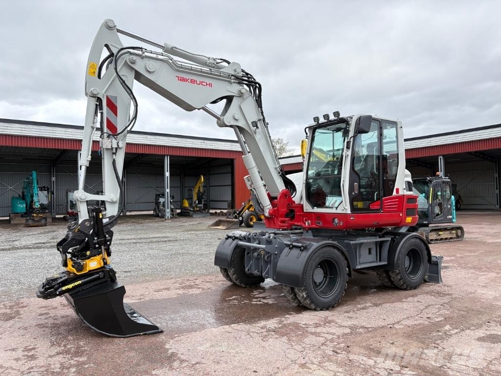 Takeuchi TB395W حفارات بعجل