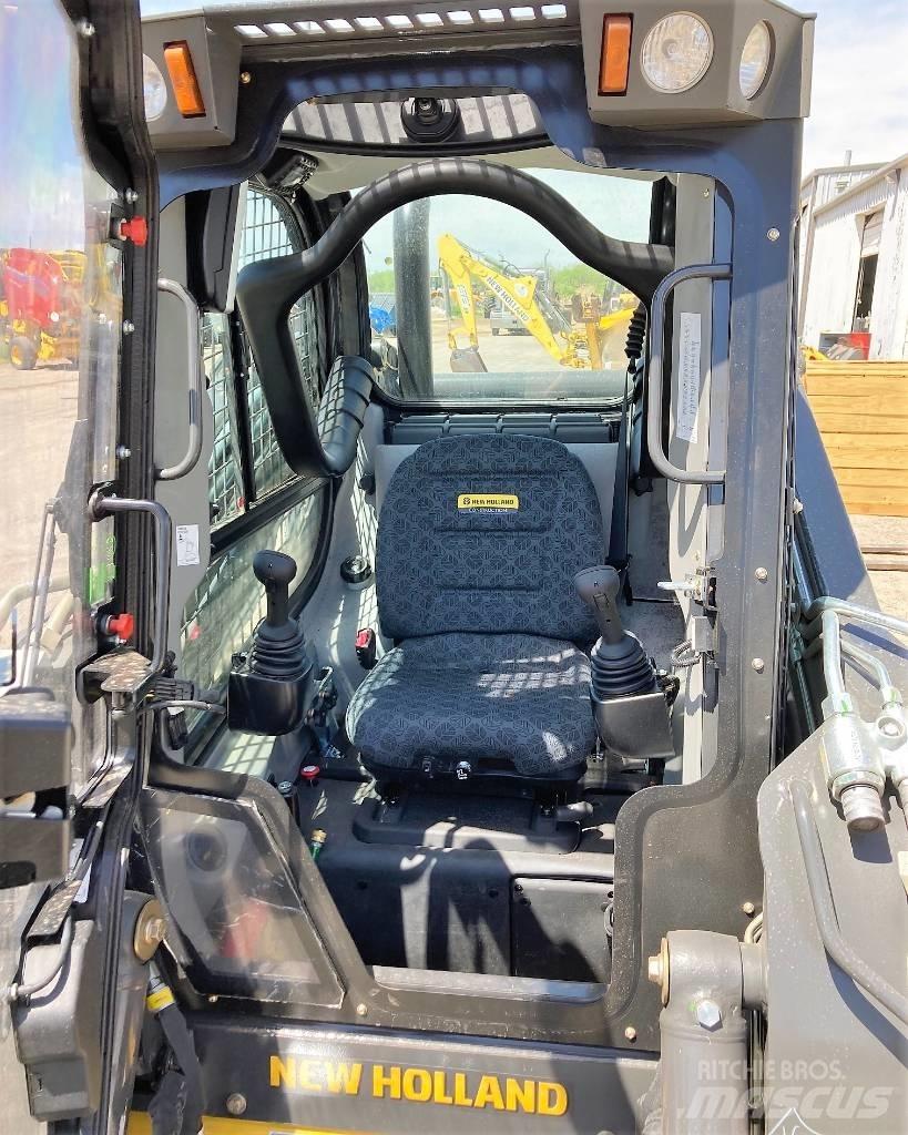 New Holland C 345 لوادر انزلاقية التوجيه
