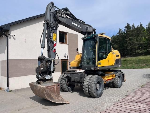 Volvo EW 140 D حفارات بعجل