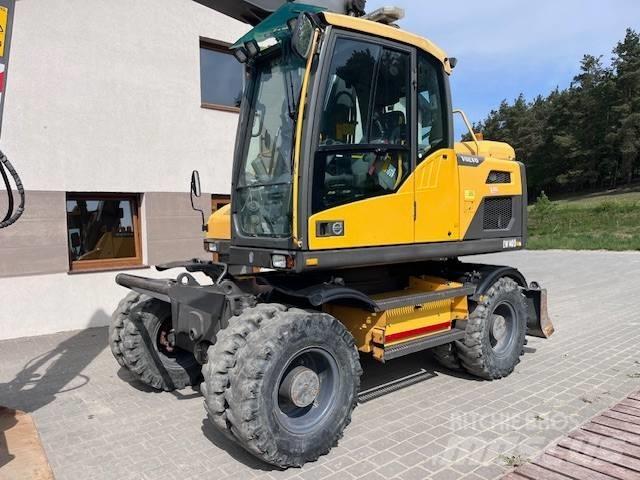 Volvo EW 140 D حفارات بعجل