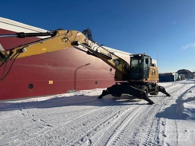 CAT MH 3022 مناولات المخلفات / مناولات صناعية
