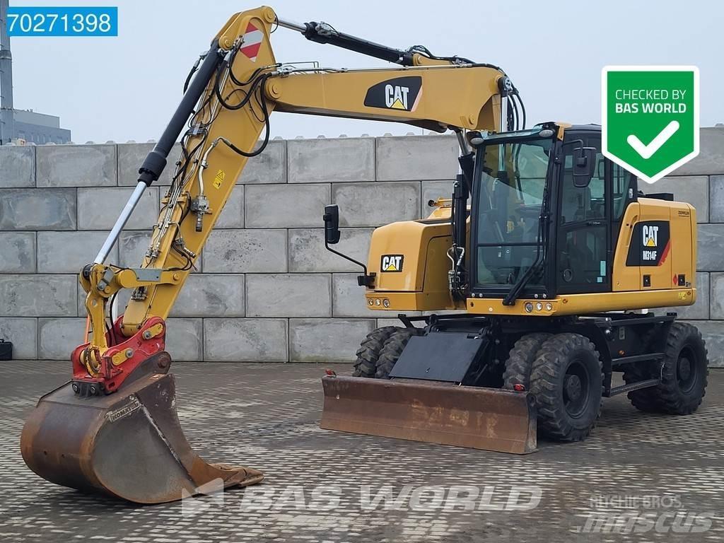CAT M314 F حفارات بعجل