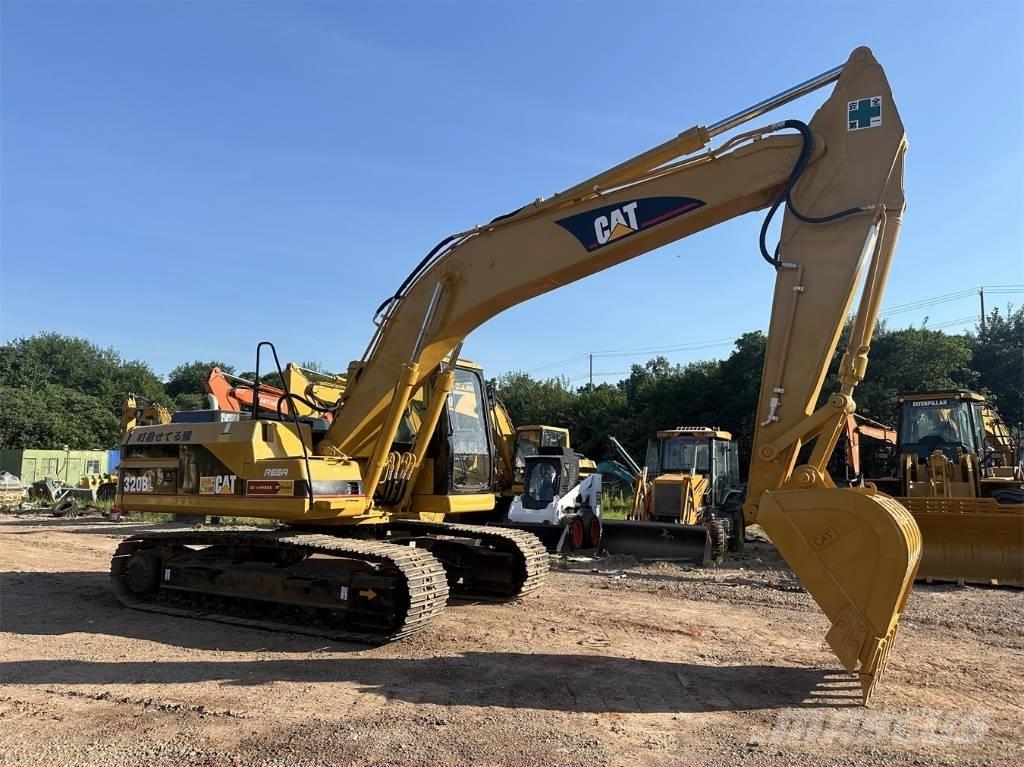 CAT 320BL حفارات زحافة
