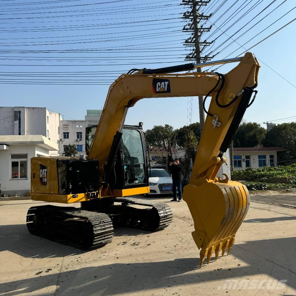 CAT 310 حفارات زحافة