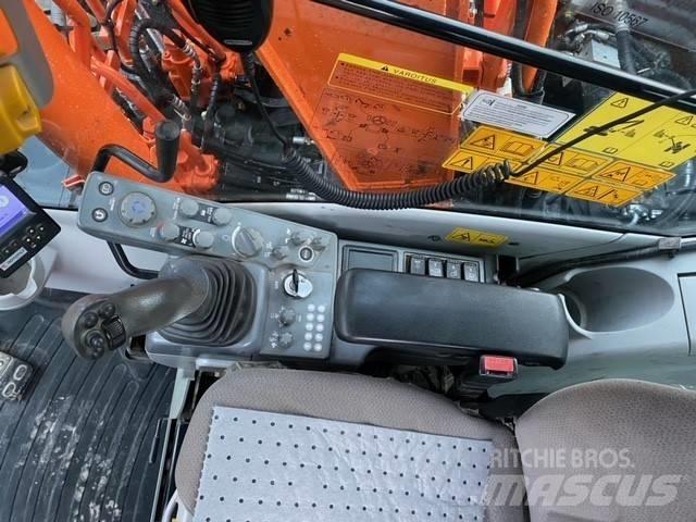 Hitachi ZX 140 W-5 حفارات بعجل