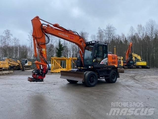 Hitachi ZX 140 W-5 حفارات بعجل