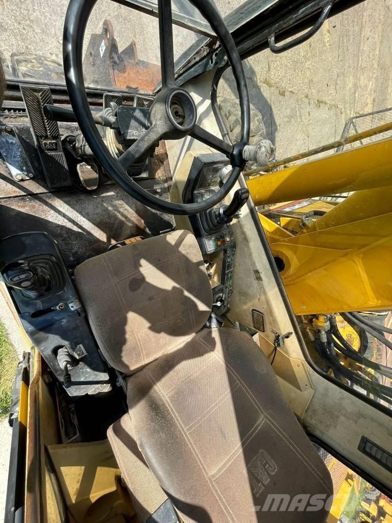 CAT M 315 حفارات بعجل