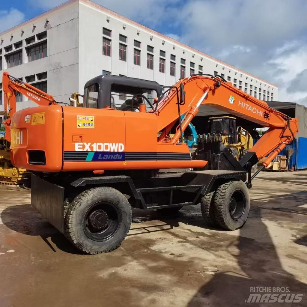 Hitachi EX 100 W D حفارات بعجل